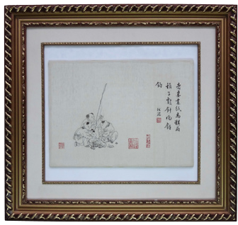 An embroidered article mounted and protected within a picture frame