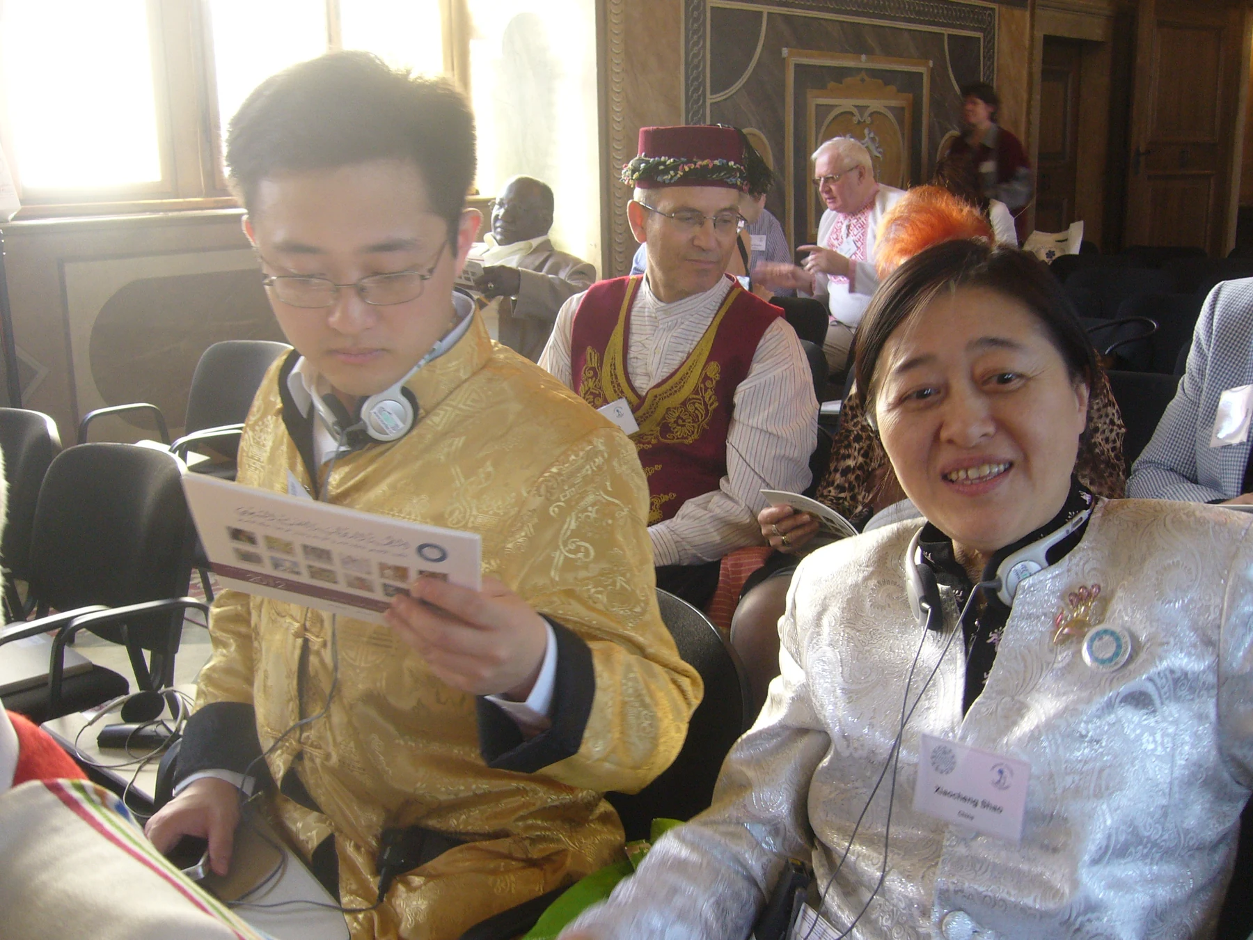 Shao Xiaocheng among IOV-badged attendees in the conference hall in Prague, April 2012.