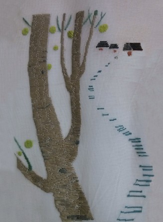 Embroidered birch trunks, green leaves and a receding path leading toward two small roof forms